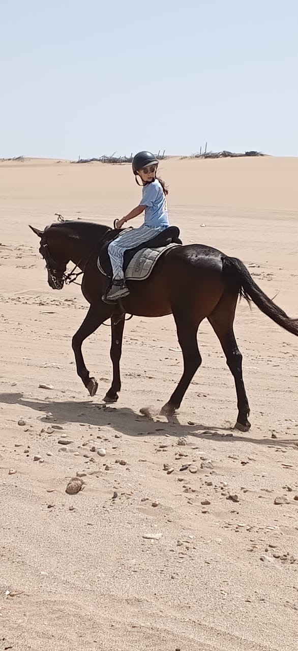 Young rider on Assif crossing the dunes